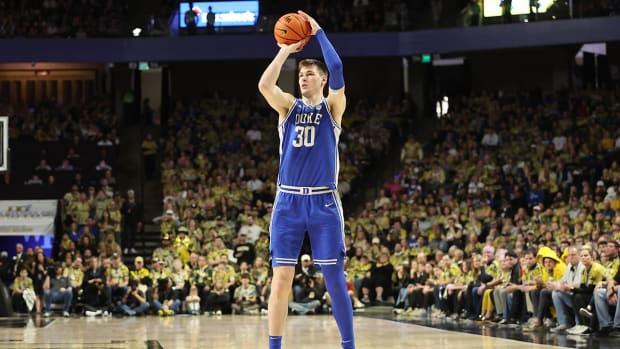 Duke Blue Devils center Kyle Filipowski shoots a three-pointer vs. the Wake Forest Demon Deacons.